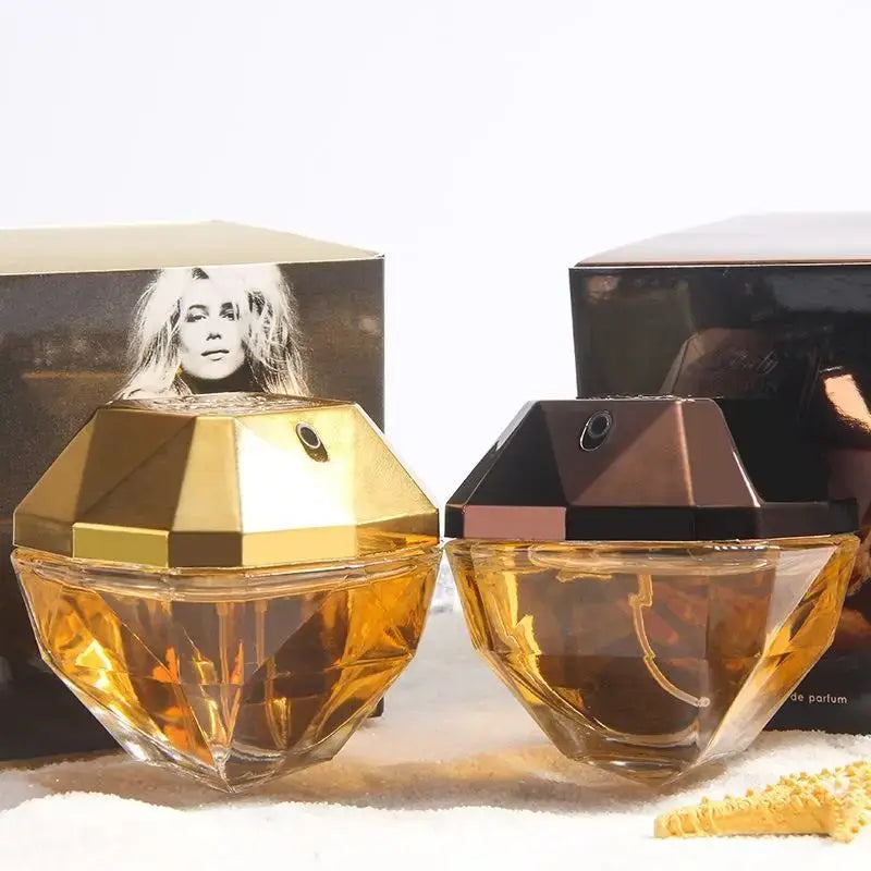 Women’s Luxury Eau de Parfum 80ml - Golden Million Attraction Perfume bottles displayed elegantly.