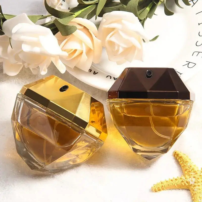 Women's Luxury Eau de Parfum 80ml - Golden Million Attraction Perfume bottles elegantly displayed with floral accents.