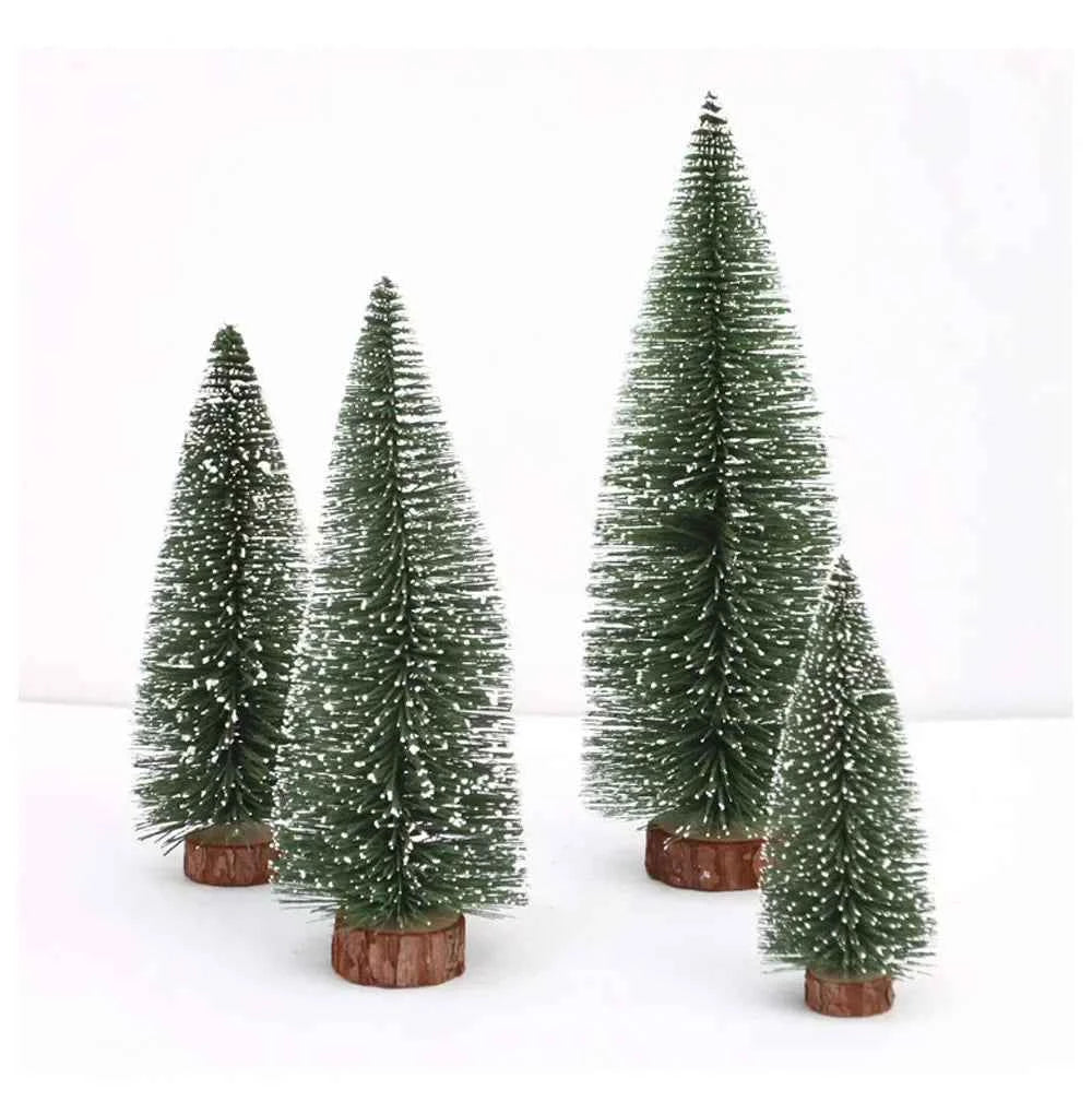 Set of four miniature pine trees with wooden bases on a white background