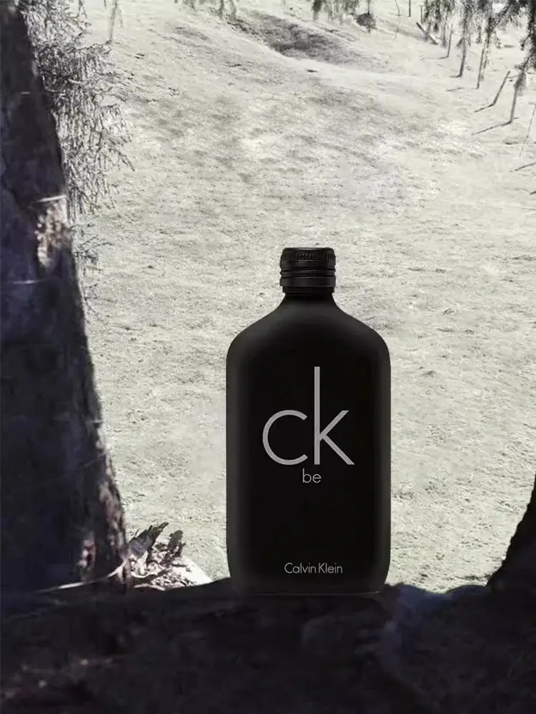 Calvin Klein CK Be Unisex Eau de Toilette - elegant black bottle set against a natural backdrop.