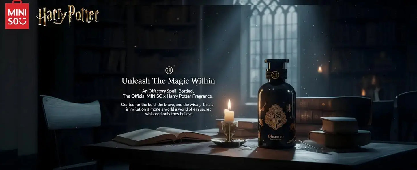 Harry Potter Unisex Woody Floral Perfume 50ml/100ml on a table with candles and an open book.